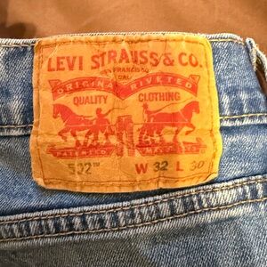 Levi's Men's Light Blue Denim Jeans with Tan Leather Patch